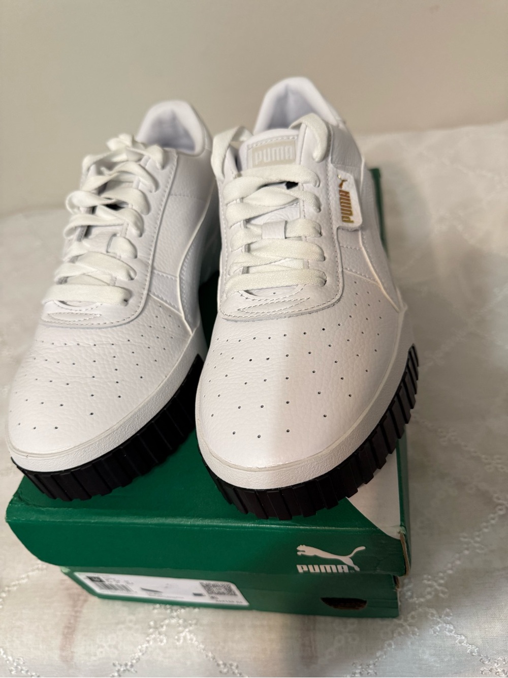Puma Women's White Leather Sneakers with Black Ridged Sole